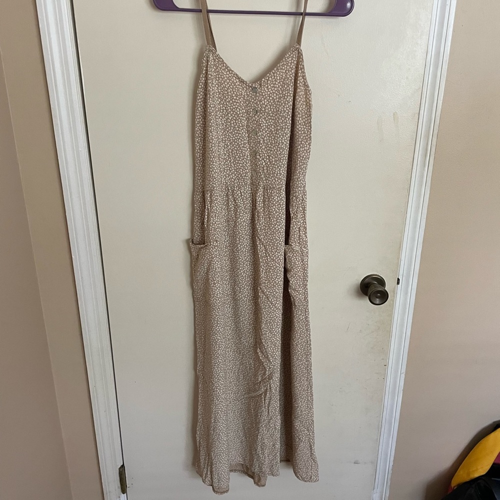 Cute boho dress from a boutique shop in Spain.  Pockets and adjustable straps